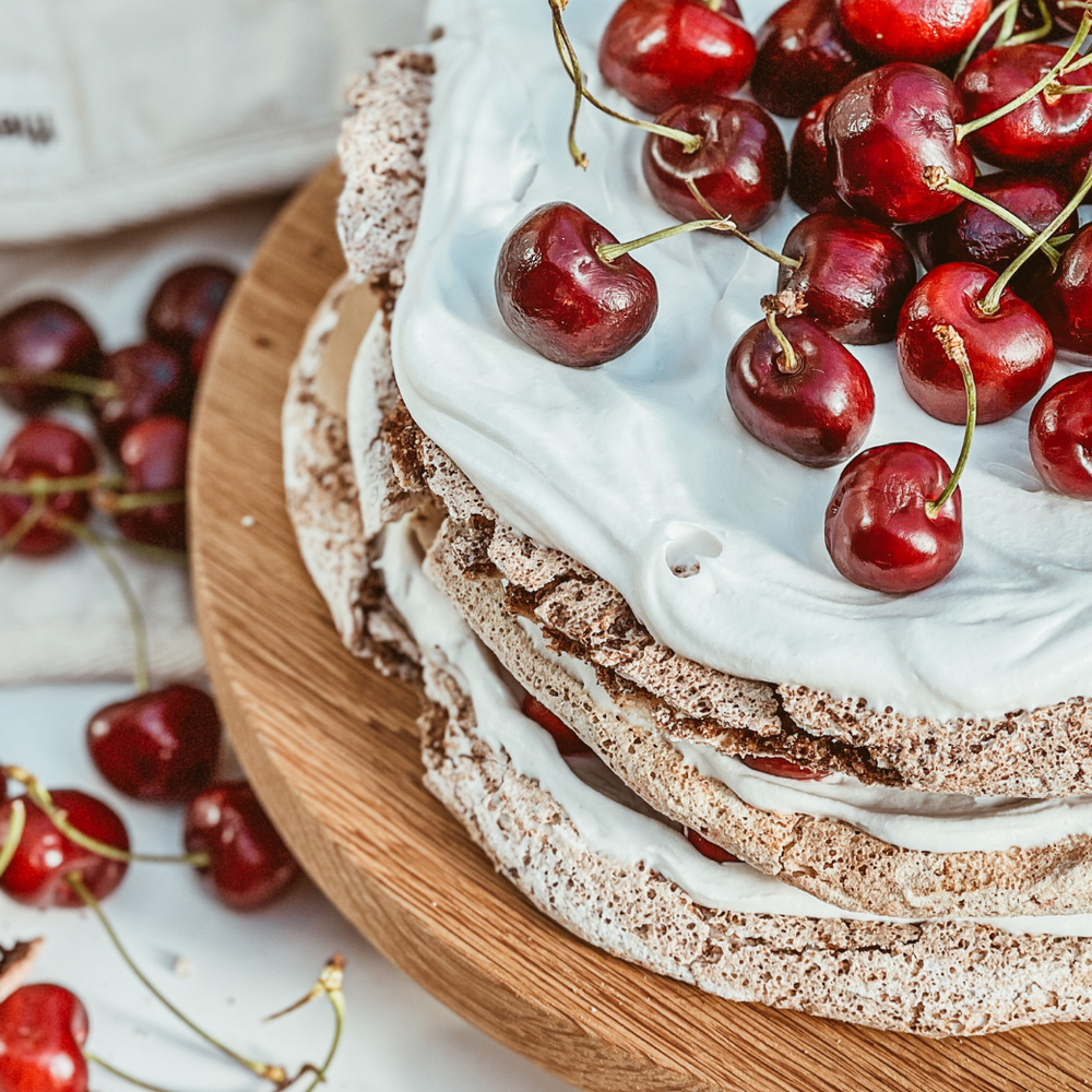 Vegan Chocolate Cherry Hazelnut Meringue Cake with Whipped Coconut Cream