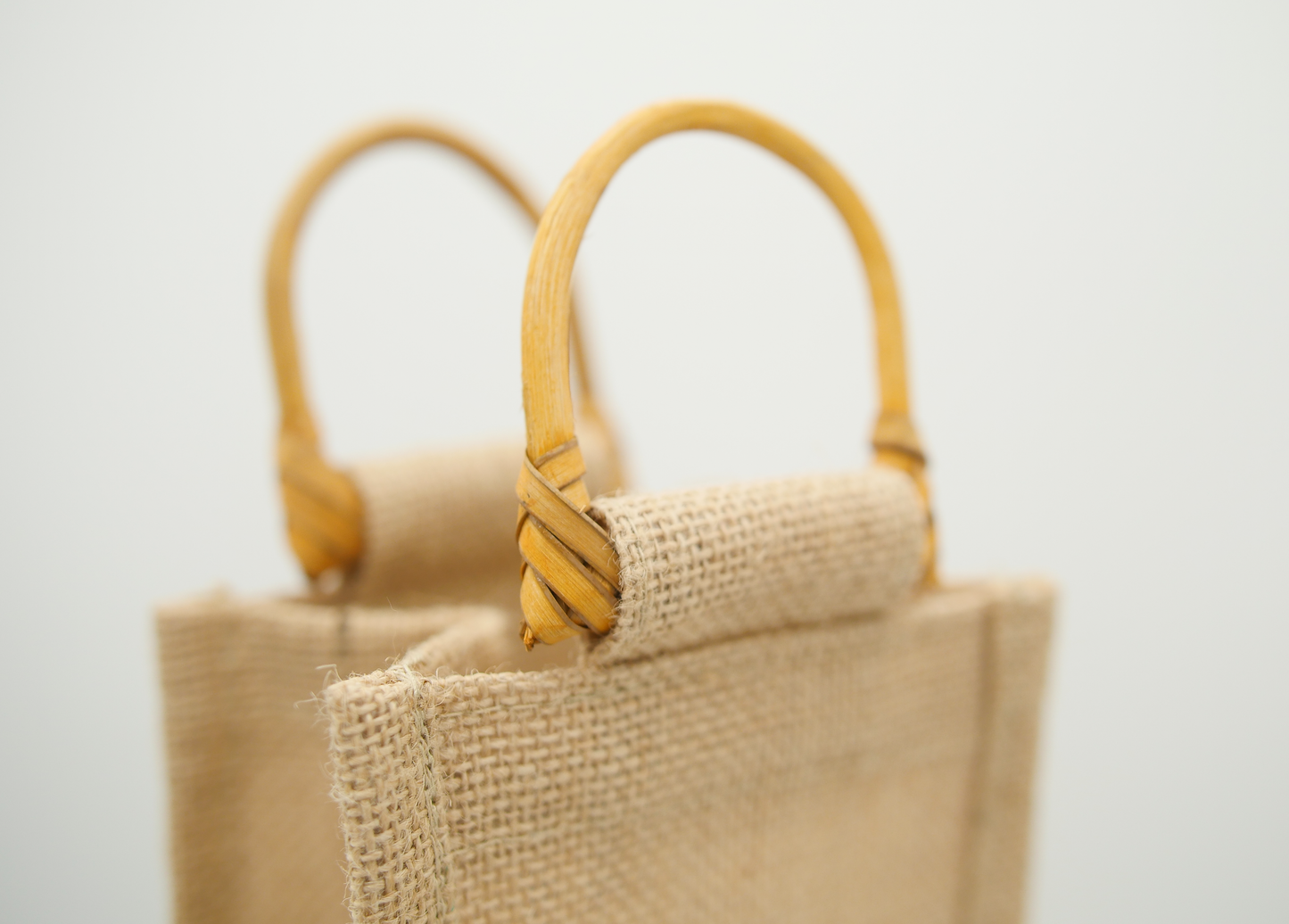 The Swag wine carry bag made from hessian featuring the lovely bamboo handles - The Swag AU