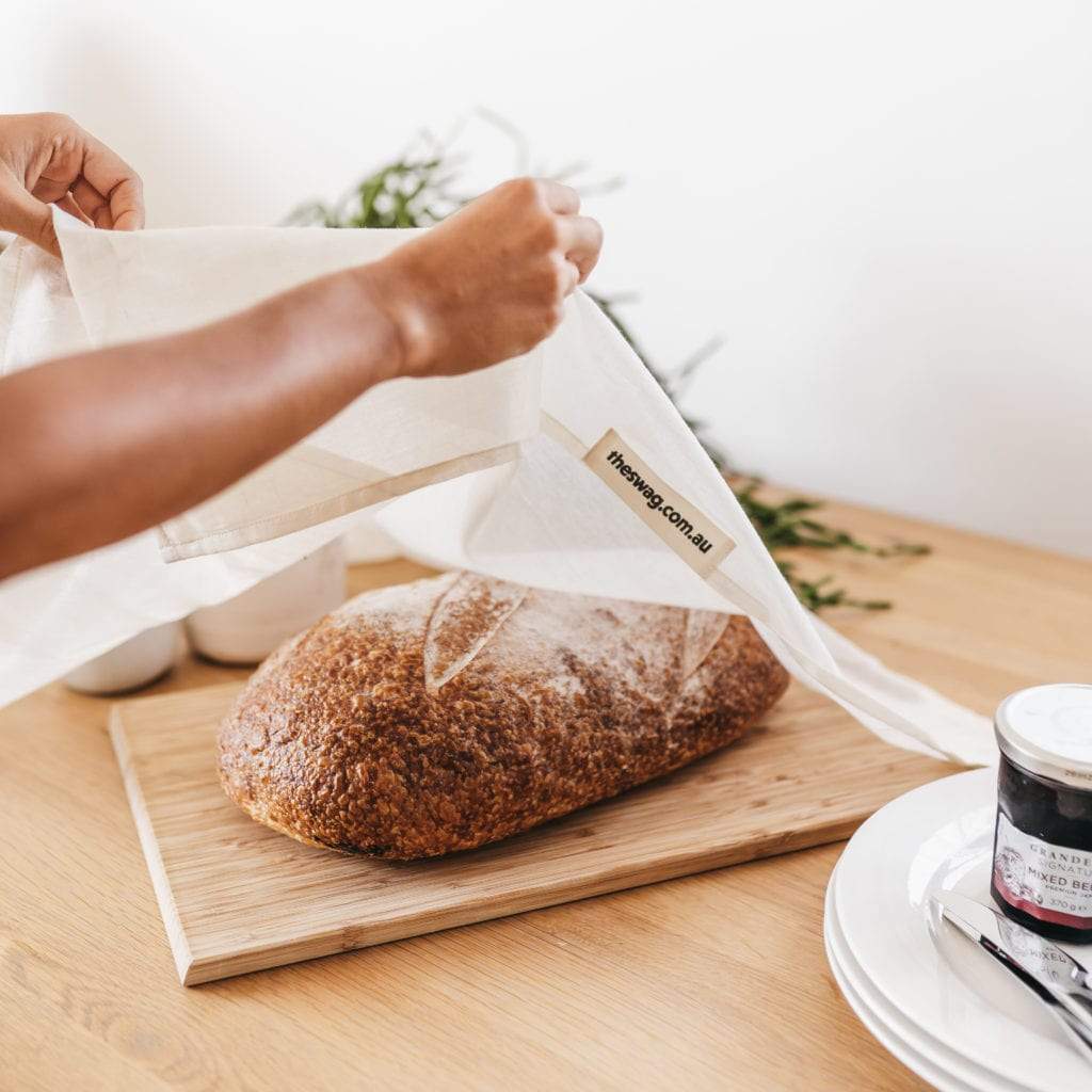 The Swag - small size from The Swag Food Cover set, covering a loaf of bread on a bread board - The Swag AU