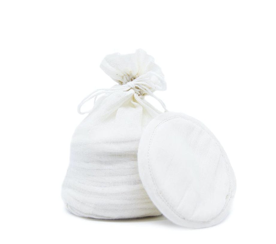 The Swag Beauty Swag Set with a wash bag and one 100% natural reusable beauty round sitting on the table 
- The Swag AU